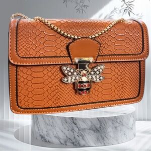 Elegant Brown Designer Bag with Gold Chain